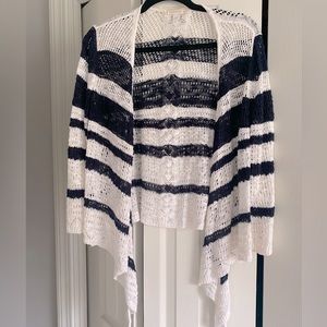 Navy blue and white cardigan.